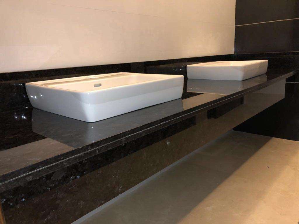 Completed bathroom stone counter and basin installation