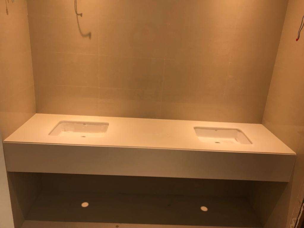 Long double basin solid-surface vanity installation